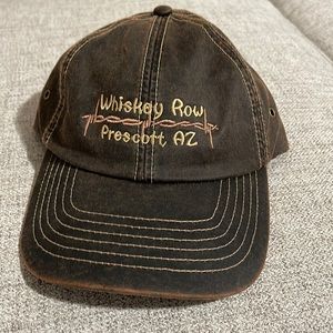This ball cap has an oiled leather look. Prescott AZ embroidery, Whiskey Row